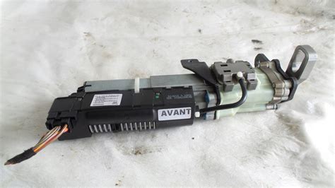 SILNICZEK KLAPY AUDI A4 B8 8K9827851 ELEKTRYCZNY SIŁOWNIK KLAPY LEWY