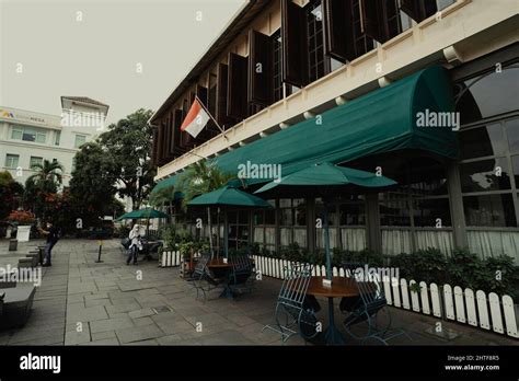 Old Cafe Batavia In Kota Tua Old Town Jakarta With The Indonesian Flag