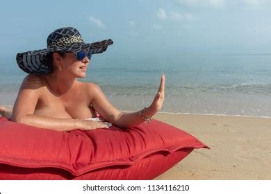 Woman Nude Black Hat Sunglasses Lies Stock Photo 1134327290 Shutterstock