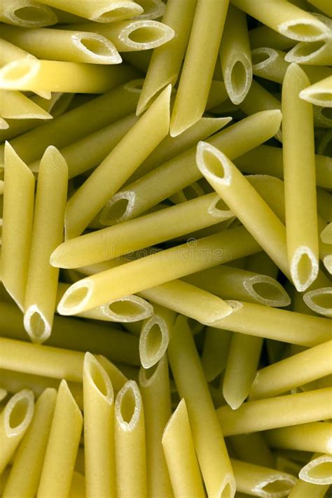 Pennette Pasta With Zucchini Mint Leaves And Parmesan Stock Photo