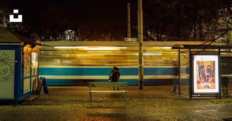 Person Standing Beside Running Vehicle Photo Free Poland Image On