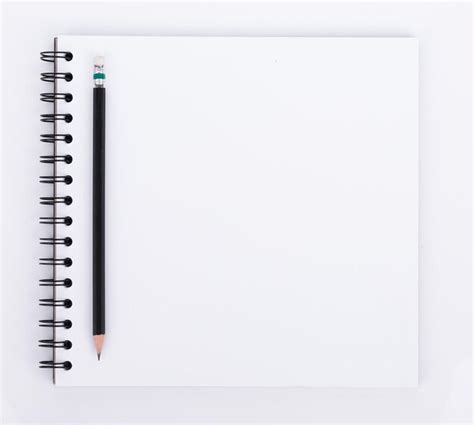 Premium Photo Directly Above Spiral Notebook With Pencil Against