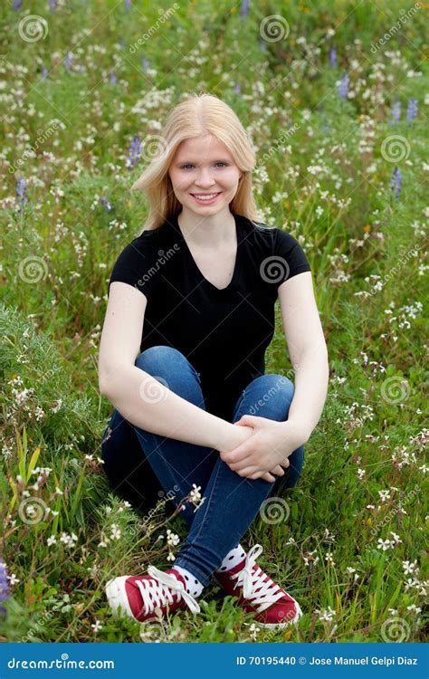 Happy Blonde Girl Surrounded By Flowers Stock Photo Image Of Happy Flowers