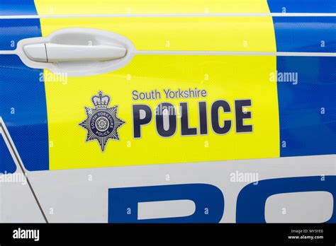 South Yorkshire Police Sign And Logo On The Side Of Police Car England