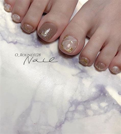 45 Pretty Toe Nails To Try In 2022 Abstract Gold And Nude Pedicure Toe Nails Feet Nail