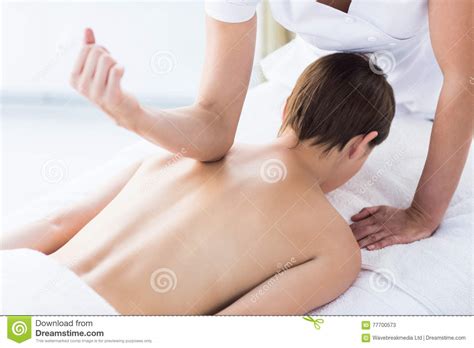 Rear View Of Naked Woman Receiving Massage Stock Image Image Of Masseur Lying 77700573