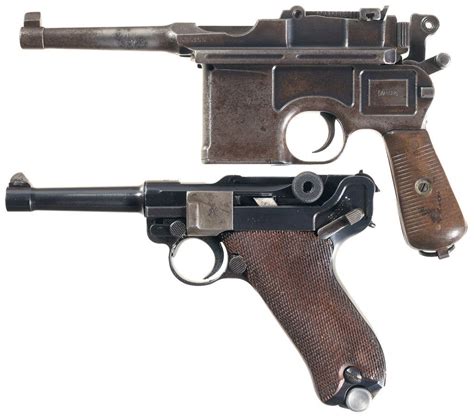 Two Semi Automatic German Pistols A Mauser Broomhandle Pistol