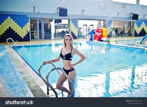 Sexy Blonde Girl Blue Swimsuit Having Stock Photo 1204572160 Shutterstock