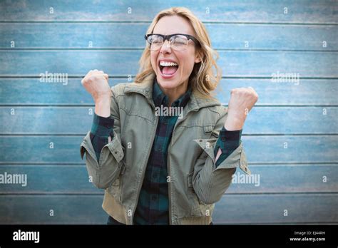 Composite Image Of Pretty Blonde Cheering Stock Photo Alamy
