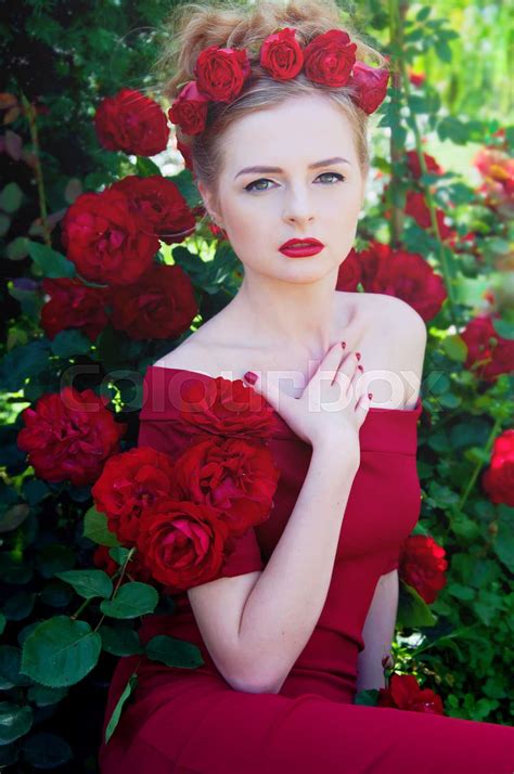 Lady Vamp In Crimson Red Dress With Naked Shoulders And Red Roses Stock Image Colourbox