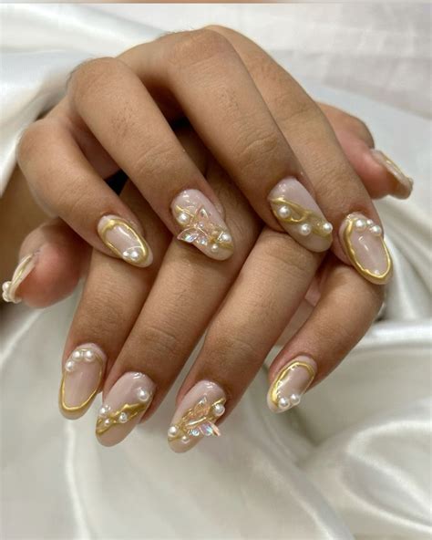 Nude Butterfly Nails With Gold And Pearl Details White Nails Gold Nails Pink Nails