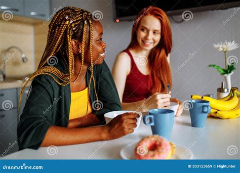 Happy Lesbian Couple Preparing Breakfast In The Kitchen Stock Image Image Of Happiness Drink