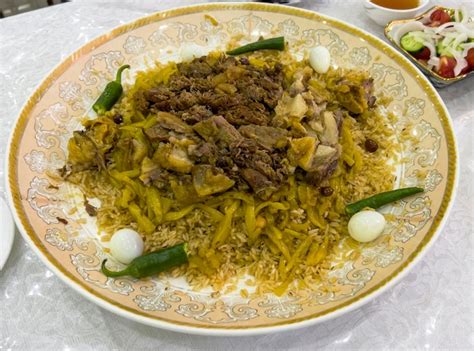 Premium Photo | Uzbek pilaf with quail eggs and pepper