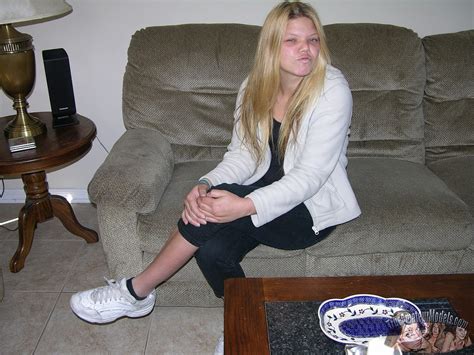 Amateur Model Strips And Spreads Her Shaved Pussy Photos