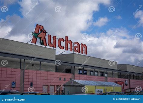 French Supermarket Auchan Logo On Top Of The Shopping Centre Building