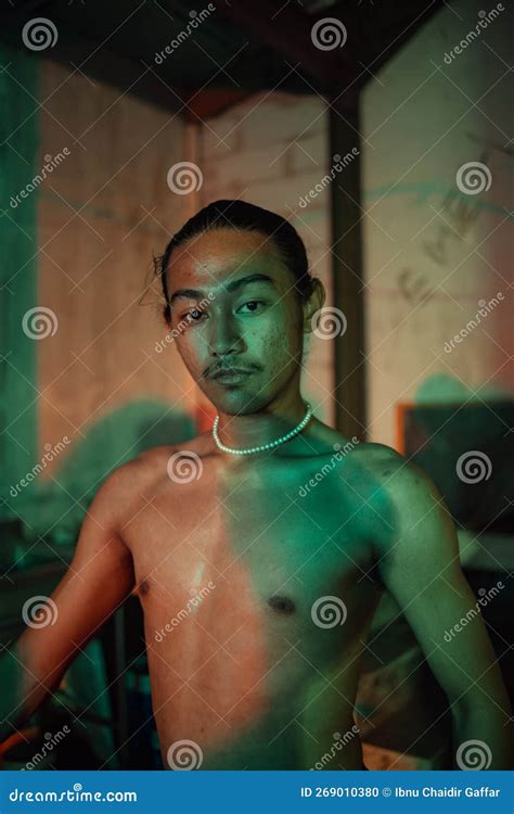 A Gay Man In Short Black Pants Posing Hotly On A Chair Stock Photo Image Of Flex Male