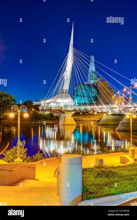 The City Skyline From The St Boniface Promenade At Night In Winnipeg