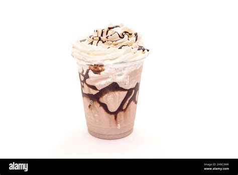 mocha flavoured frappe served   plastic cup  whipped cream