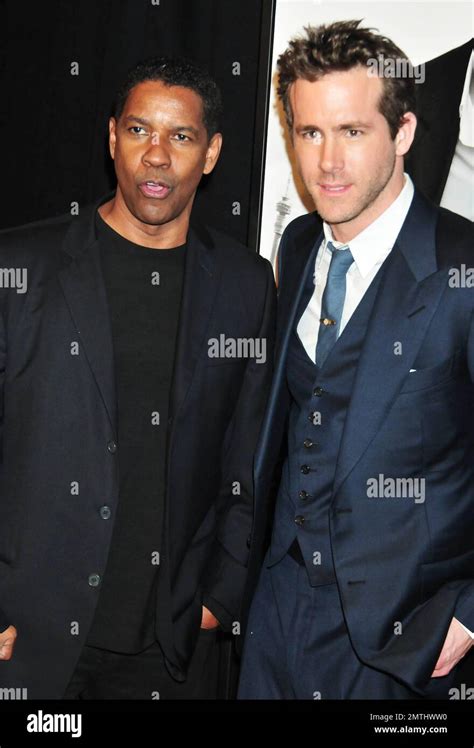 Denzel Washington And Ryan Reynolds At The Premiere Of Safe House