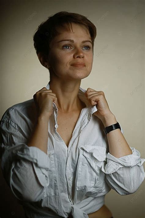 Studio Portrait Of A Brunette With A Short Haircut Photo Background And Picture For Free