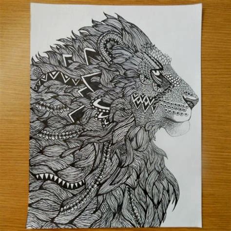 Awesome ornamented lion portrait in profile tattoo design ...