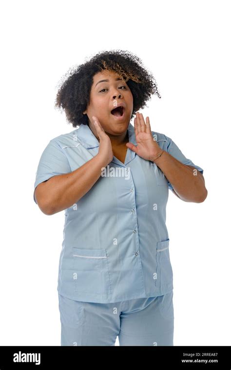 Vertical Portrait Of Venezuelan Afro Latina Female Doctor In Blue Uniform Standing With Hands