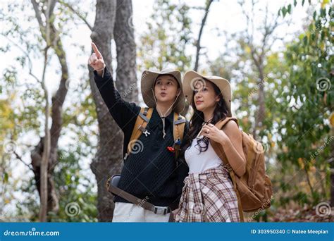Cheerful Romantic Lesbian Couple Traveler With Backpack On Their Backs