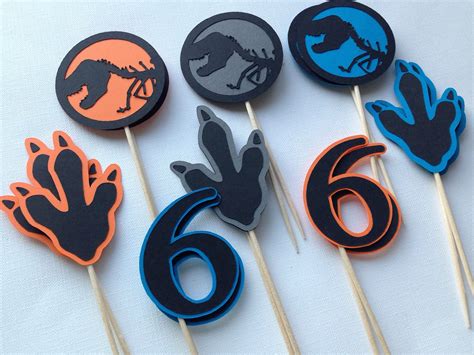 Jurassic World Dinosaur Cupcake Topper Set Etsy Dinosaur Cupcake Toppers Dinosaur Themed