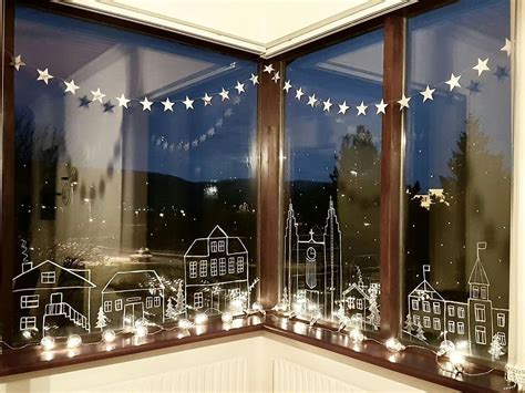 Chalk Pen On Window For Nice Winter Or Holliday Decoration Gold