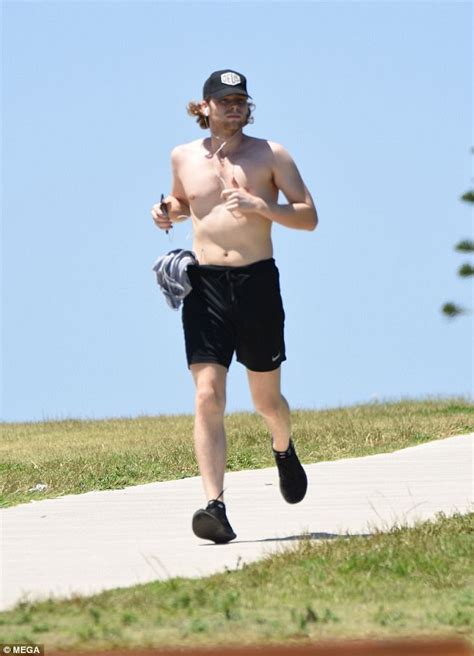 5SOS Frontman Luke Hemmings Goes For A Shirtless Jog Daily Mail Online