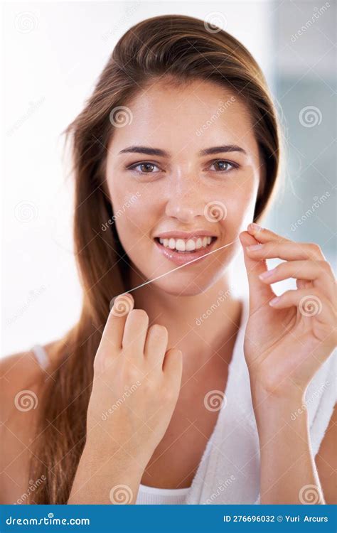 She Knows The Importance Of Flossing Portrait Of An Attractive Young