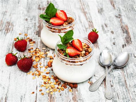 Yogurt and granola for breakfast 5384255 Stock Photo at Vecteezy