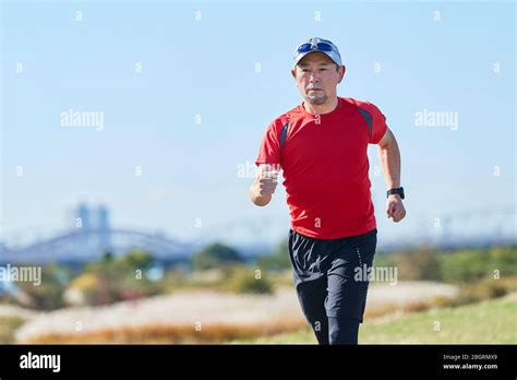 Mature Japanese Man Training Downtown Stock Photo Alamy
