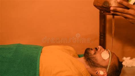 man  ayurveda healing therapy  head relaxation massage stock