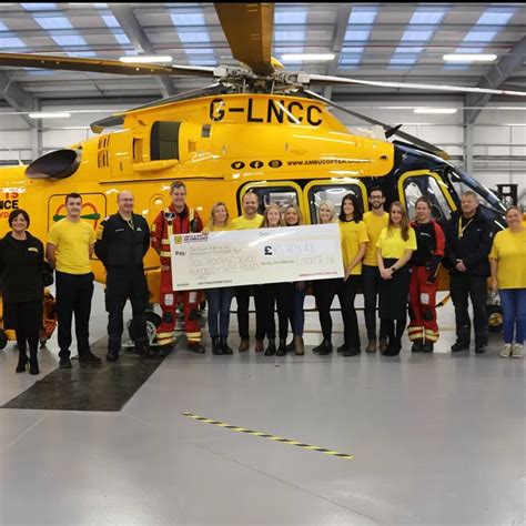 Charity Cheque Presentation With Lincs And Notts Air Ambulance