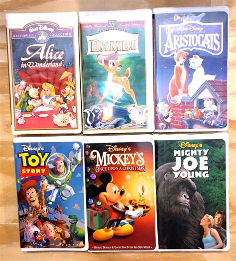 Disney (6) VHS - Bambi, Toy Story, Aristocats, Mickey, Alice Wonderland
