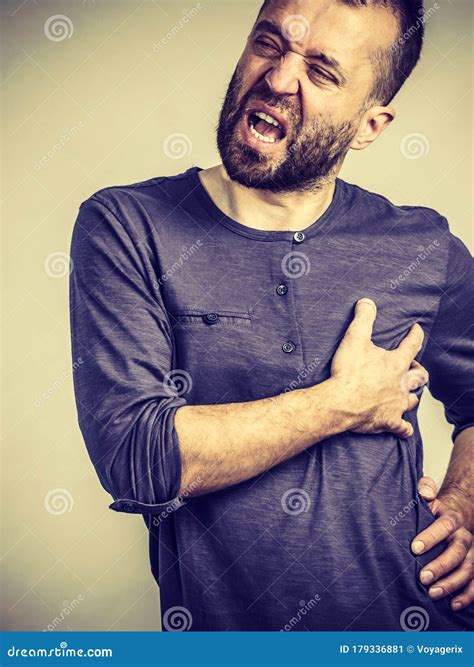 Man Having Stomach or Ribs Pain Ache Stock Image - Image of indigestion