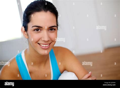 Beautiful Brunette Girl Sitting In Fitness Gym Stock Photo Alamy