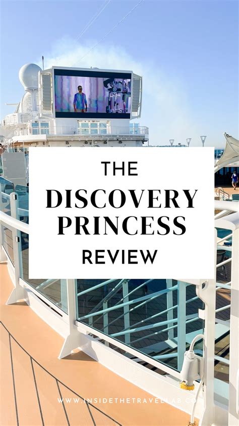 The Discovery Princess Review Sign On Top Of A Cruise Ship