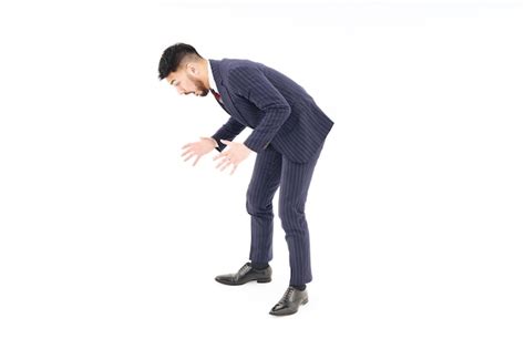 Premium Photo Businessman Looking At The Bottom Of The Screen