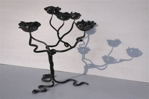 Metal Sculpture With Flower Candle Holders