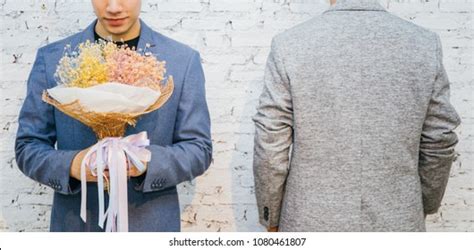Gay Couple Holding Bouquet Flowers Ready Stock Photo