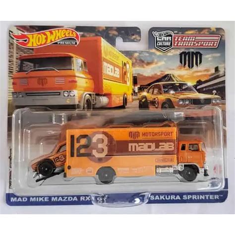 Hot Wheels Team Transport Mad Mike Mazda RX GT Sakura Sprinter Universo Hot Wheels