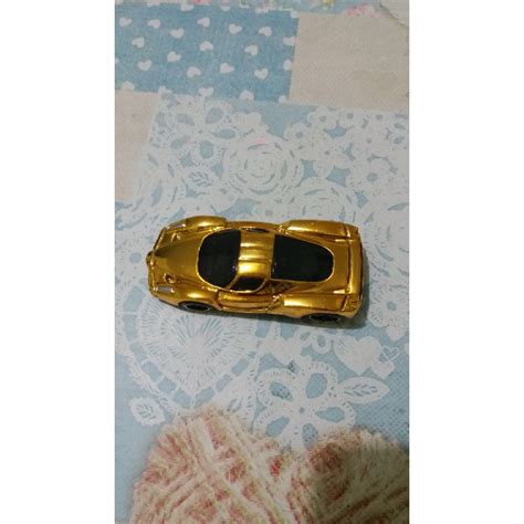 HOT WHEELS ENZO FERRARI RACER DOURADA Shopee Brasil