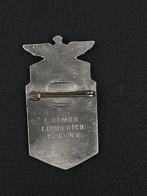 WARSTORY AUCTION - Знак периода третьего рейха. NSDAP 1935