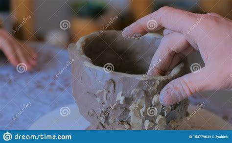 Professional Male Potter Working In Workshop Studio Stock Image