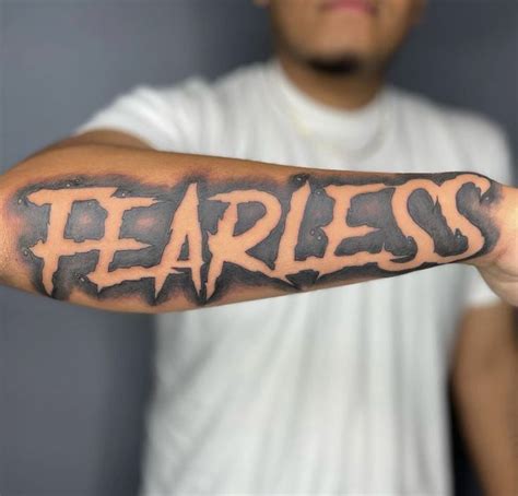 Fearless Tattoo On Man S Arm