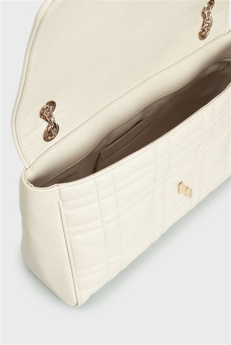 Женская белая сумка RE-LOCK QUILT Calvin Klein K60K609884 — MD-Fashion