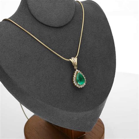 18ct Emerald And Diamond Pendant