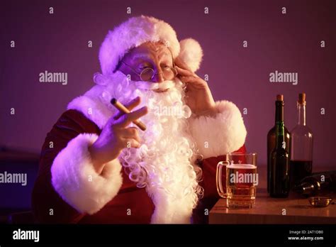 Funny Drunk Santa Claus With Cigar In Pub Stock Photo Alamy